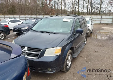 2009 Dodge Grand Caravan Sxt z USA, uszkodzony, nr VIN 2D8HN54149R539214